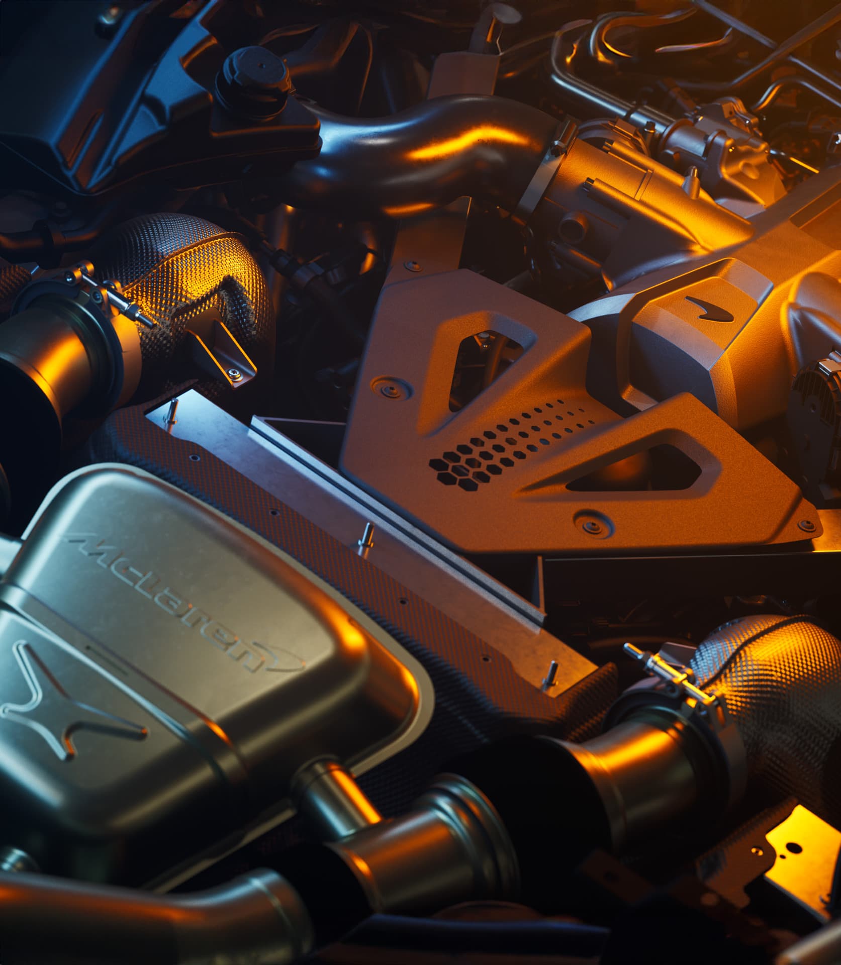 A close-up, top-down view of a McLaren's V8 engine bay, highlighting the intricate exhaust system, heat shielding, and the 'McLaren' logo on the manifold, all with a warm, metallic glow.