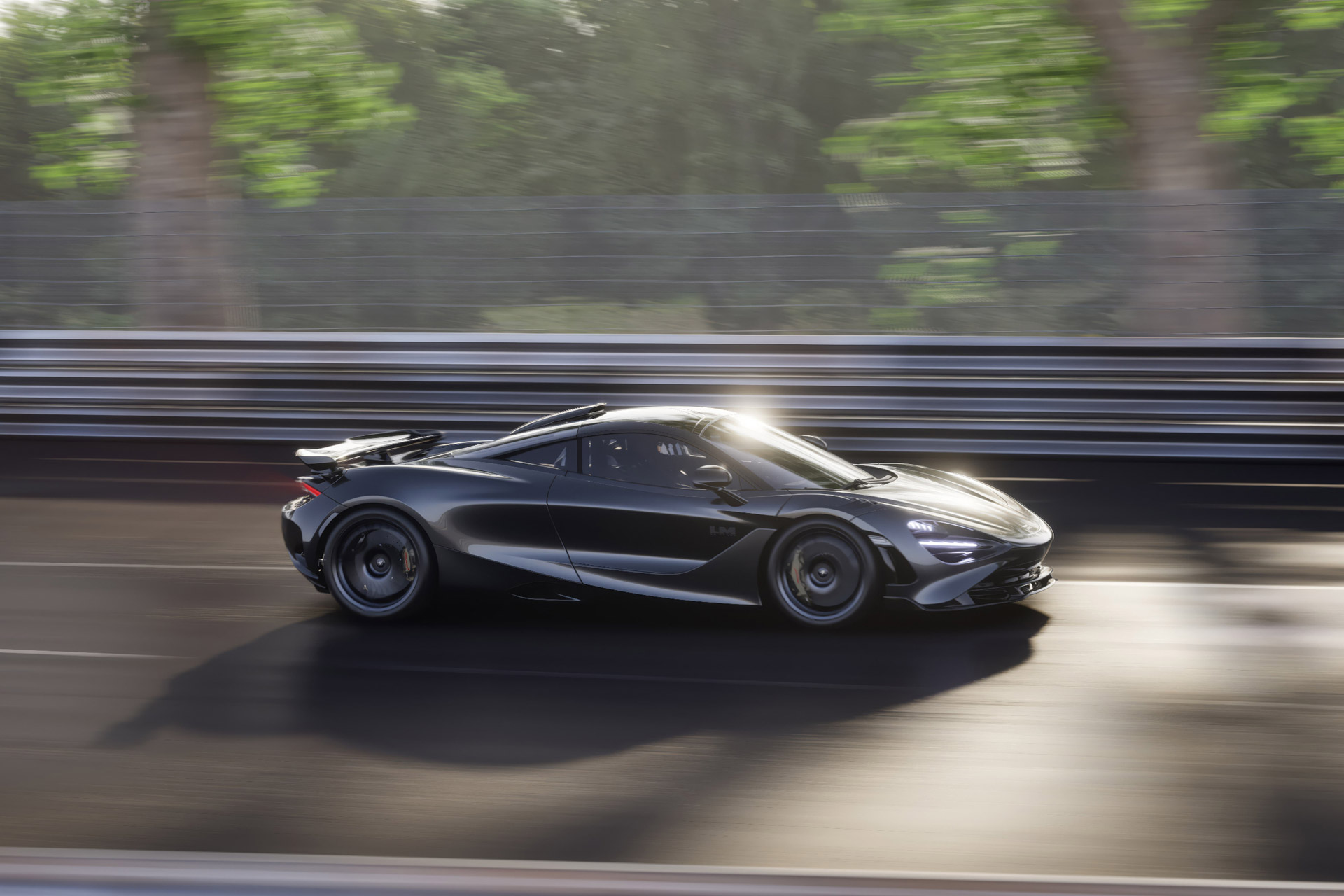 A side view of the McLaren 750S Le Mans Edition in motion on a racetrack, highlighting its dynamic design and aero features.