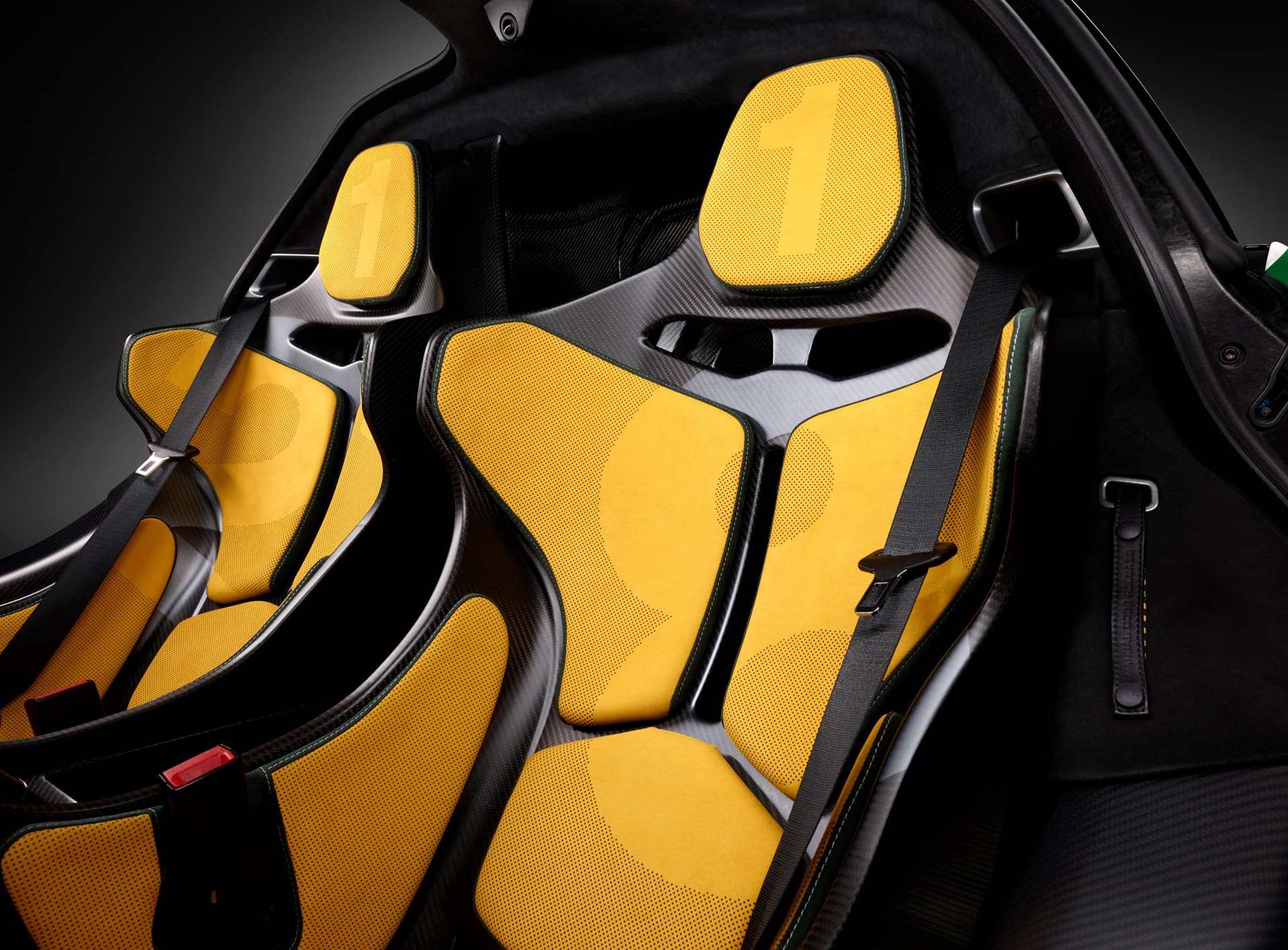 Bespoke McLaren car interior with custom yellow seats.
