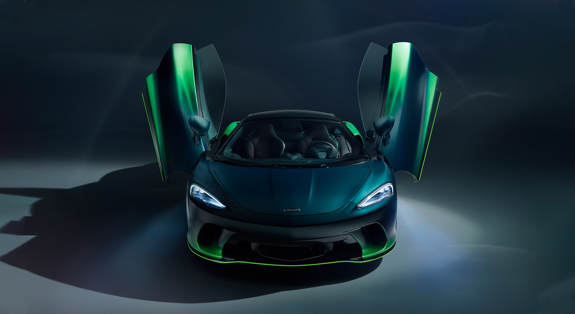 Front view of McLaren Verdant theme GT with the doors open.
