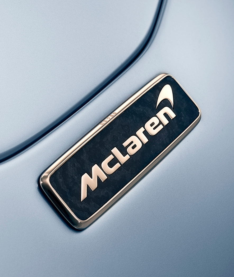 McLaren badge on a silver car.