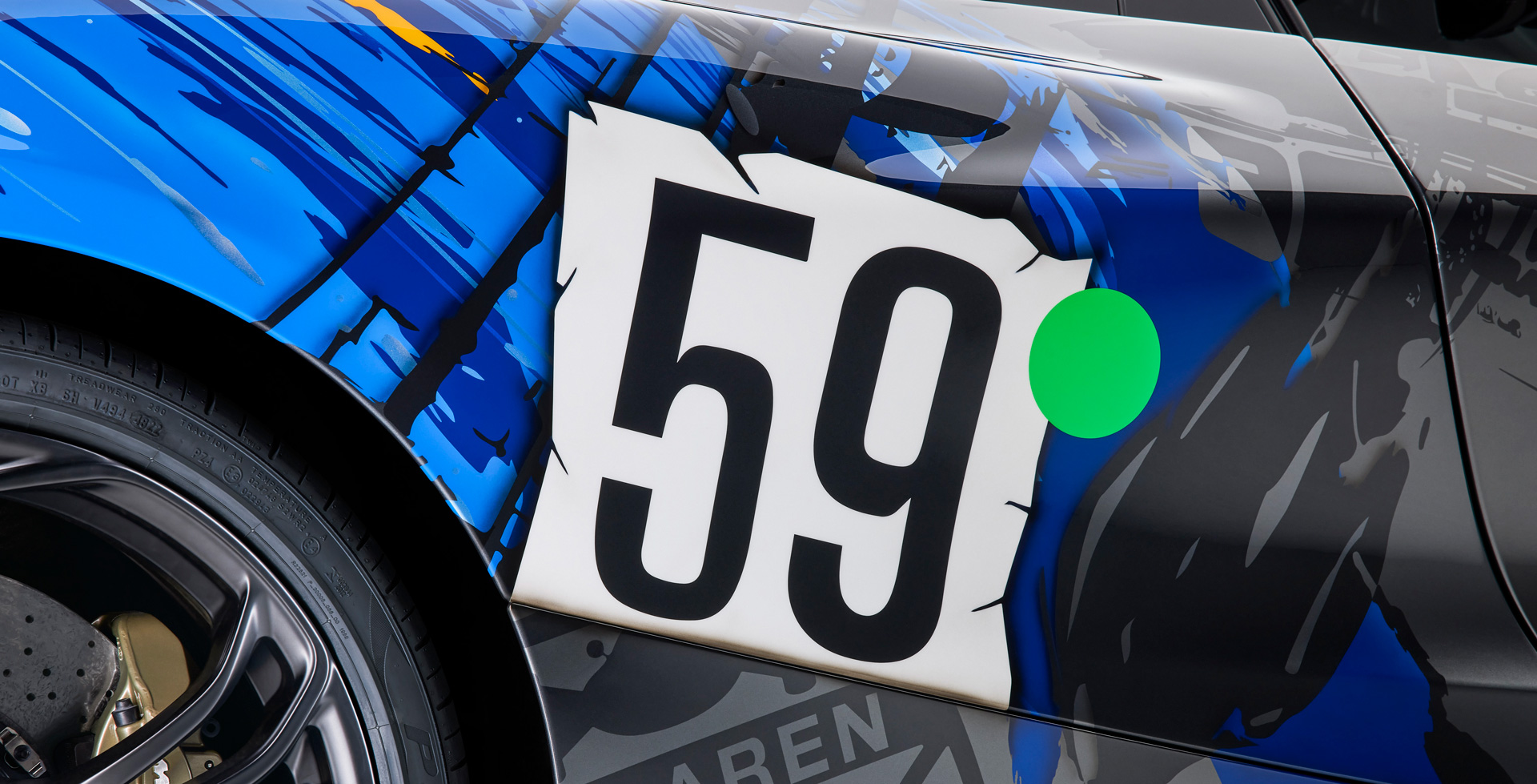Close up of number 59 on Mclaren 750S with 3-7-59 theme.